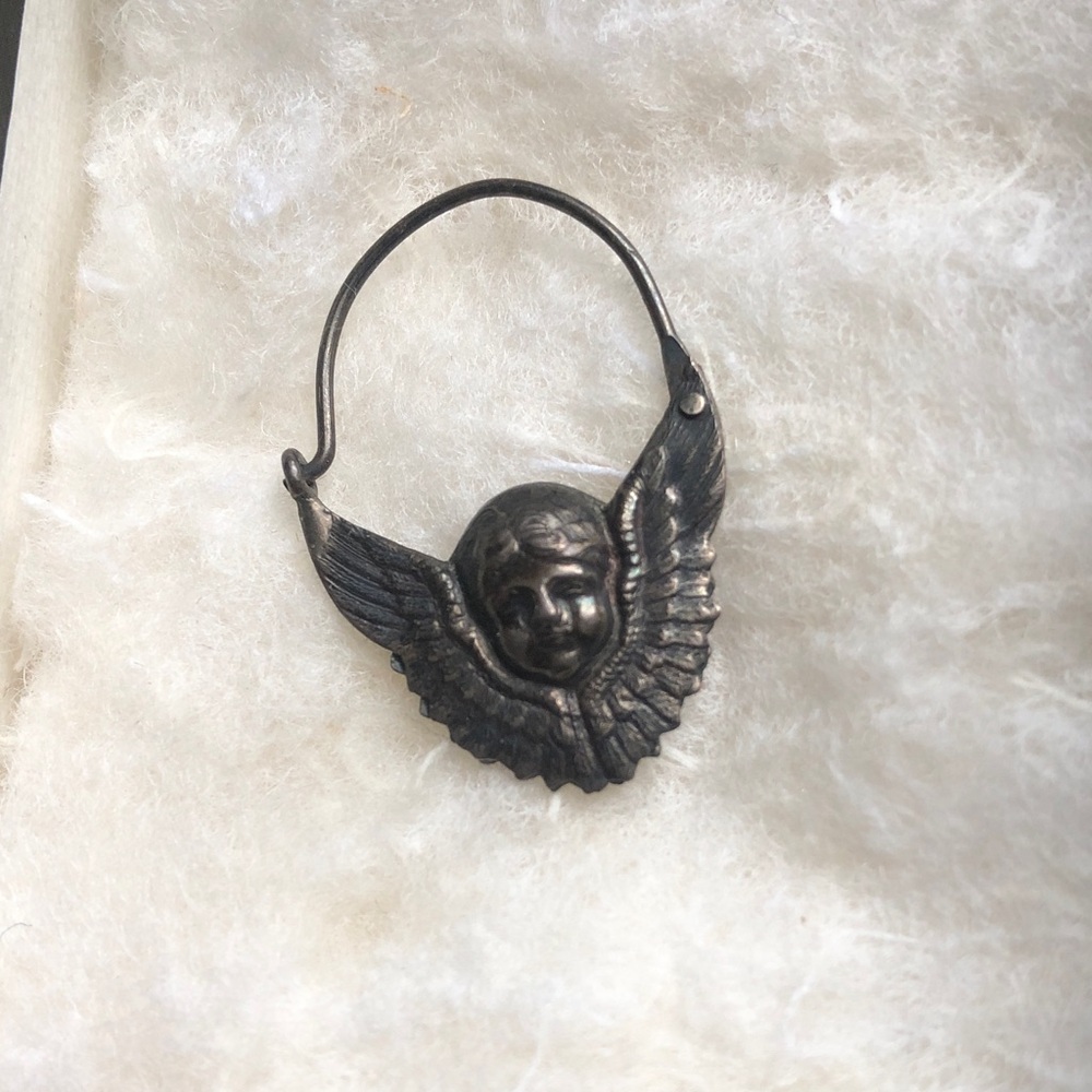 Single silver angel earring